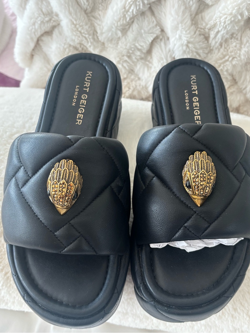 Kurt Geiger Black Quilted Slide Mules with Gold Emblem